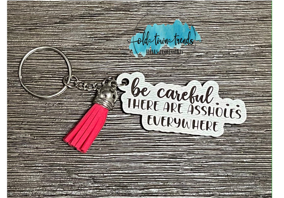 Be careful there are assholes everywhere Keychain, package fillers, gifts, great add on sellers